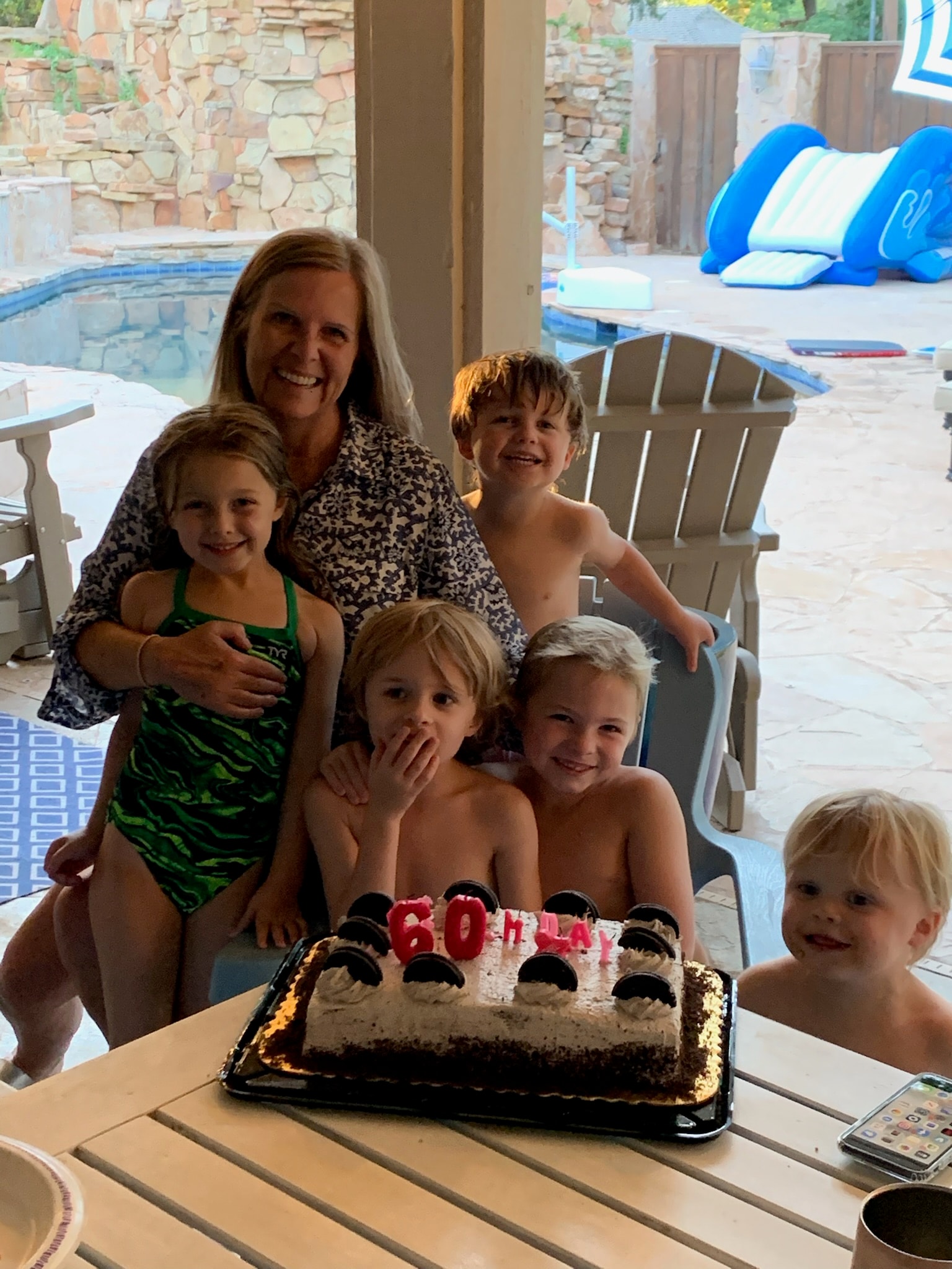 Susan Zouzalik — Gigi — celebrating her 60th birthday surrounded by her grandchildren